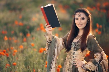 Ortaçağ Poppies dolu büyülü bir alanda bir kitap okuma