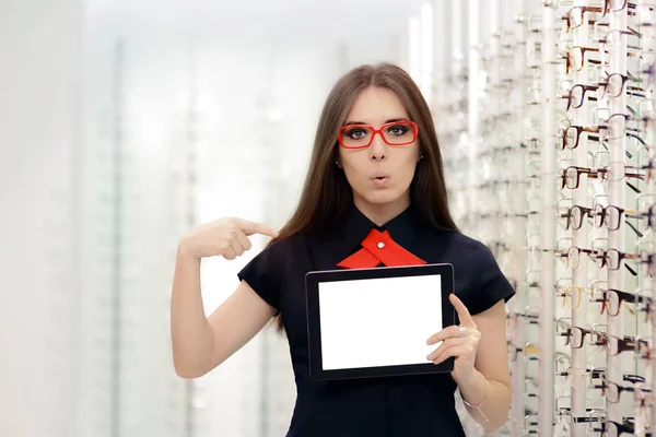 Surprised Woman with PC Tablet in Medical Optic Store — Stock Photo, Image