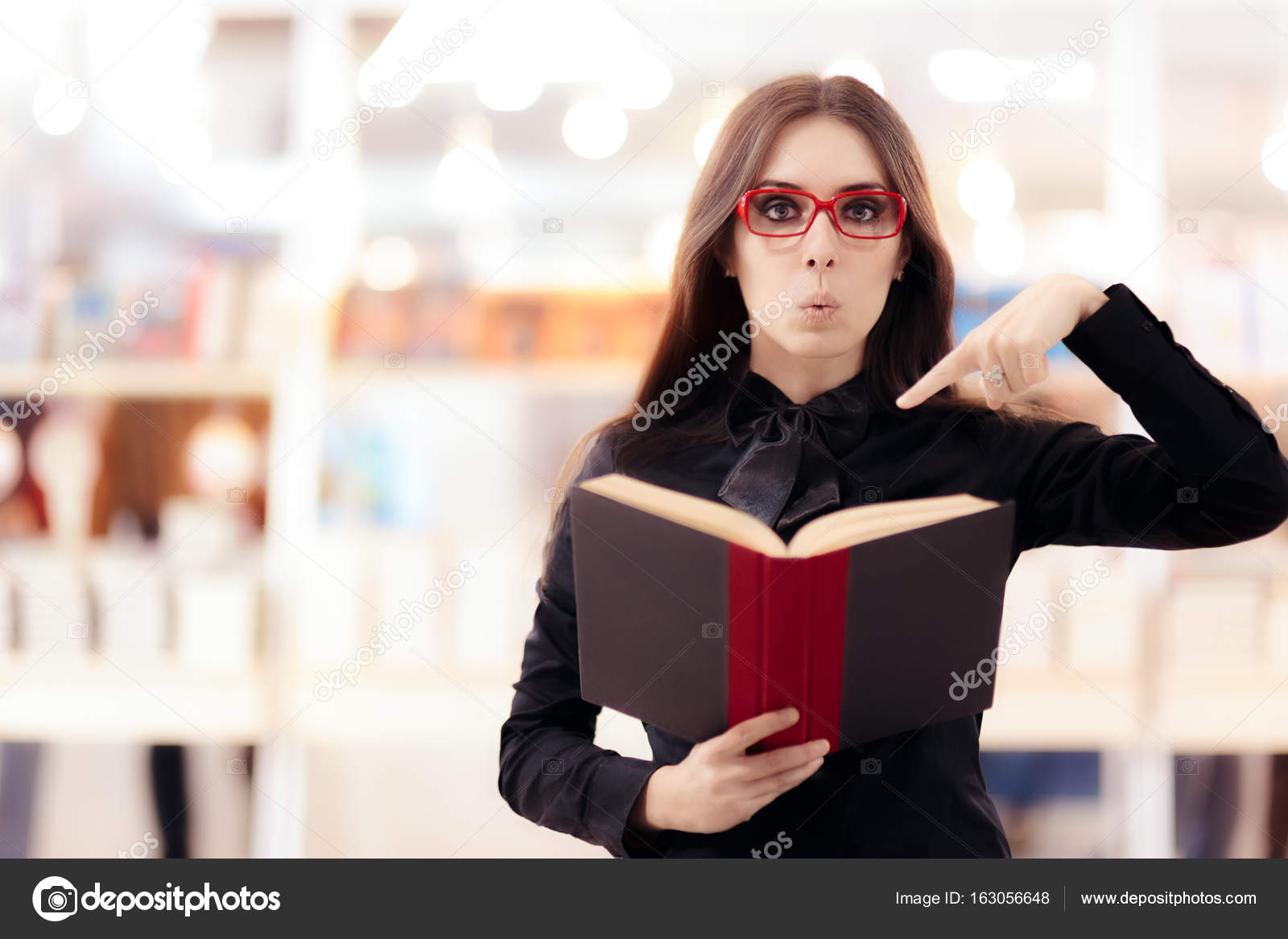 Funny Girl Reading a Book in front of a Bookshelf Stock Photo by ©nicoletaionescu 163056648 Funny Girl Reading a Book in front of a Bookshelf Stock Photo by ©nicoletaionescu 163056648