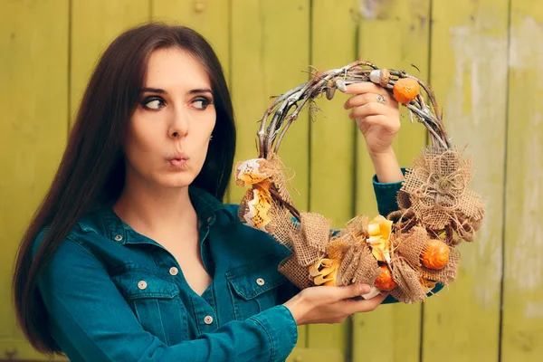 Surprised Girl Holding Decorative Autumn Wreath — Stock Photo, Image