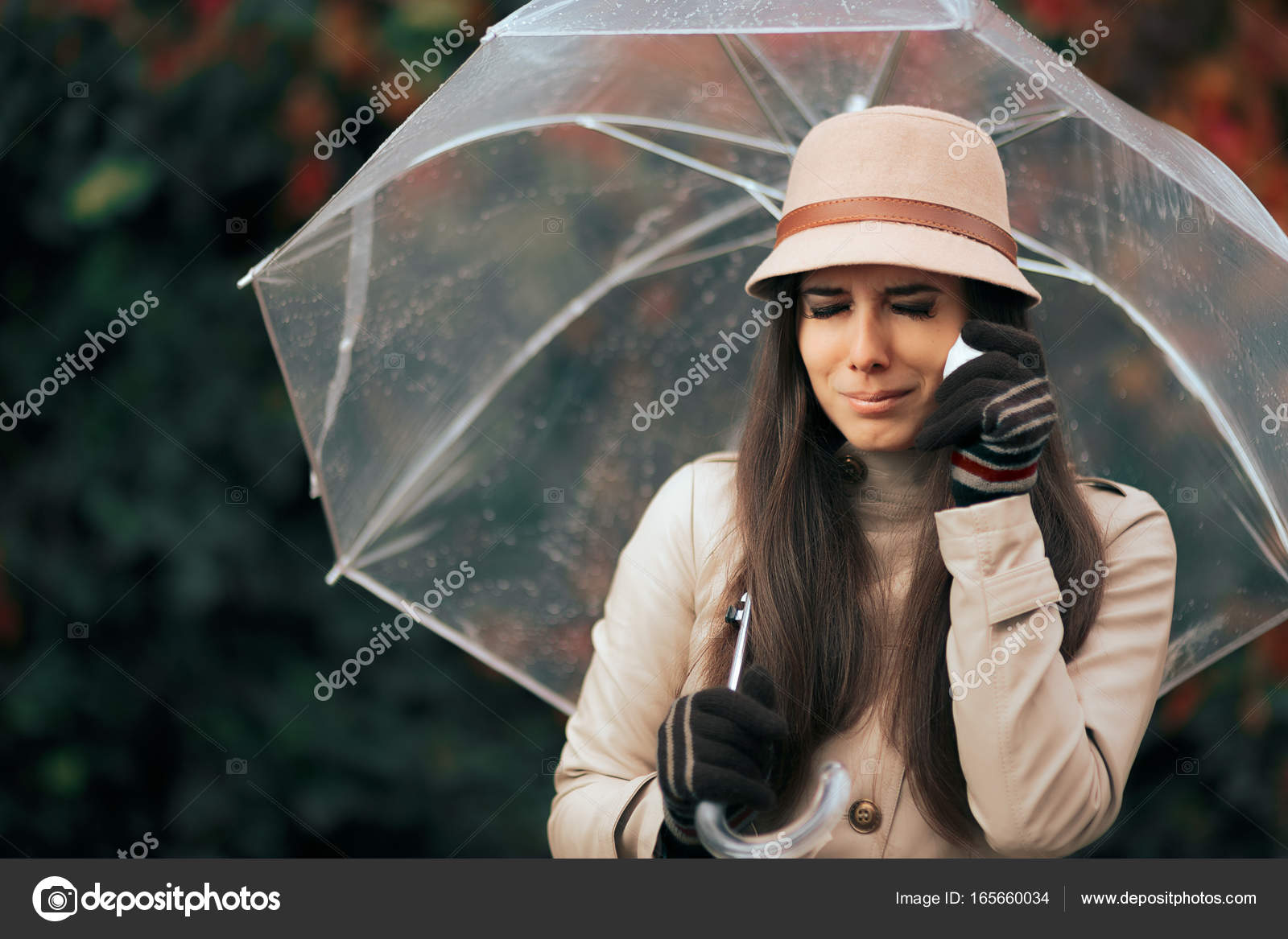 sad girl in the rain with umbrella