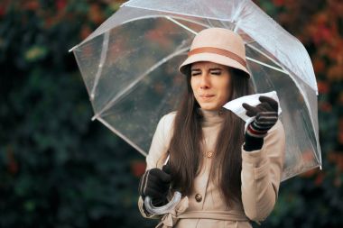 Sick Woman Holding  Umbrella in Autumn Rain Suffering from Allergies clipart