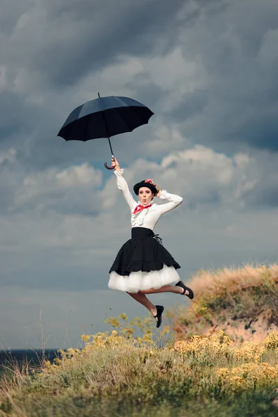 Fantezi portre havada şemsiye ile Retro kadın