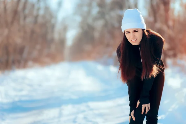 Woman Suffering Running Injury Leg Accident in Winter Training Session — Stock Image Woman Suffering Running Injury Leg Accident Winter Training Session Royalty Free Stock Photos