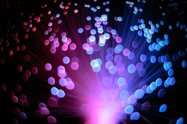 Optik Fiber pembe ve mavi soyut teknoloji kavramı arka plan 