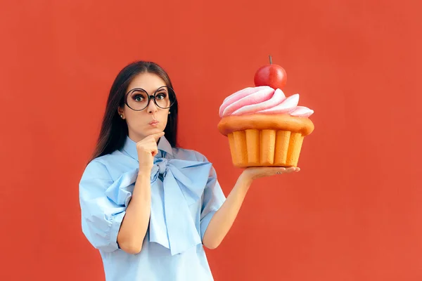 Funny Girl Holding Big Huge Giant Sweet Muffin Cupcake — Stok Foto