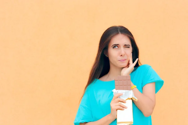 Woman Suffering Toothache Eating Chocolate — Stock Photo, Image