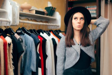Fashionable Woman in Clothing Store with Fedora Hat clipart