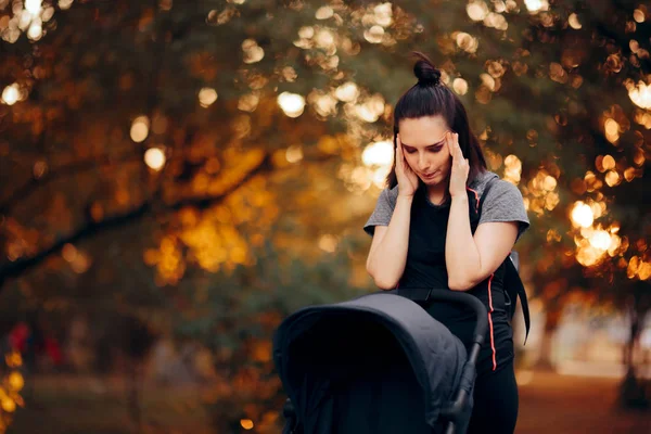 Exhausted Mother Having Headaches Pushing Baby Stroller — Stock Photo, Image