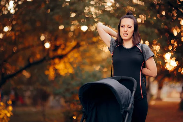 Woman Stretching Park Next Baby Stroller — 스톡 사진