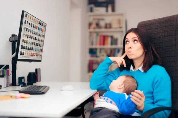 Forgetful Mother Holding Baby Her Lap Desk — Stockfoto