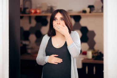 Pregnant Woman Feeling Sick in Her Kitchen  clipart