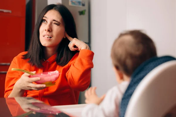 Baby Eating Mother Ignoring Her Protesting — Stock Photo, Image