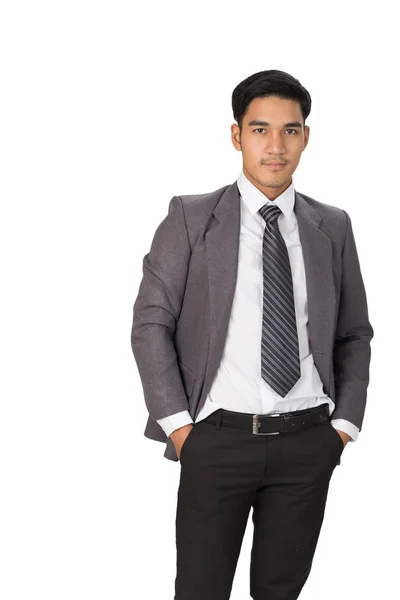 Uomo d'affari che indossa abito grigio in piedi e posa su bianco Bac — Foto Stock
