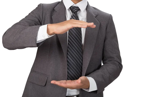 Zakenman in casual grijs pak gebaren met handen — Stockfoto