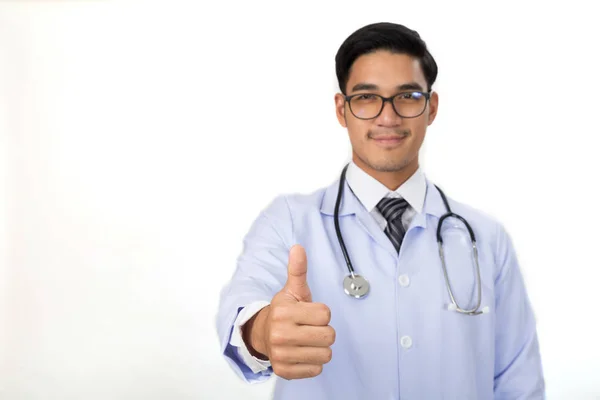 Portrait of a smiling young male doctor with stethoscope show th — Stock Photo, Image