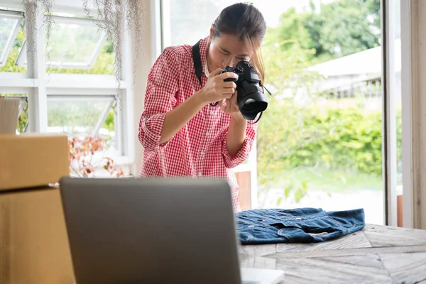 start up small business owner take photo of her product for sell