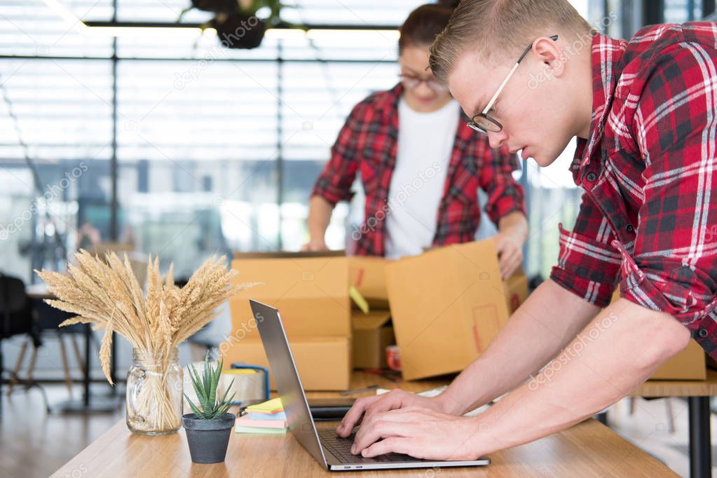 startup small business owner working with computer at workplace.