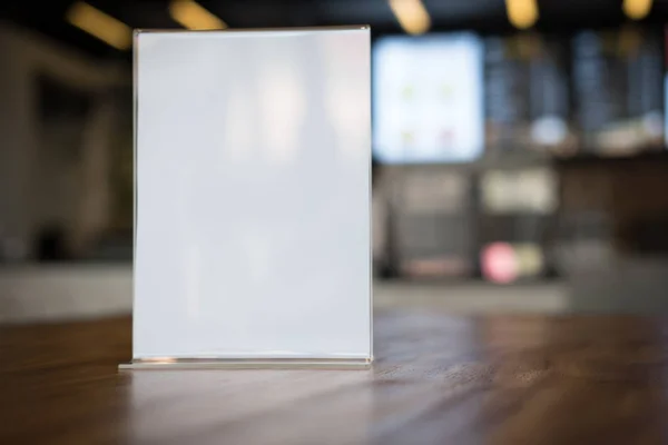 white label in cafe. display stand for acrylic tent card in coff