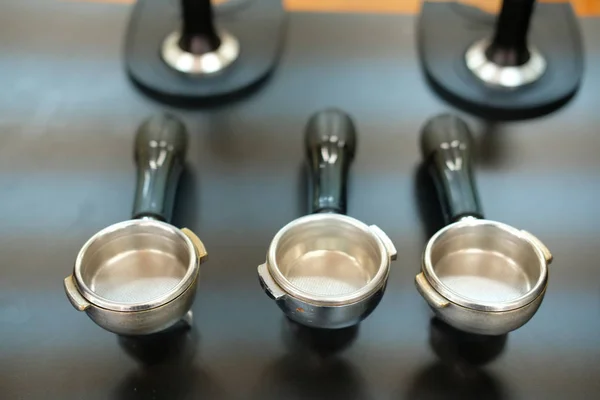 Portafilter & tamper on counter bar at cafe. espresso tamping fo — Stock Photo, Image