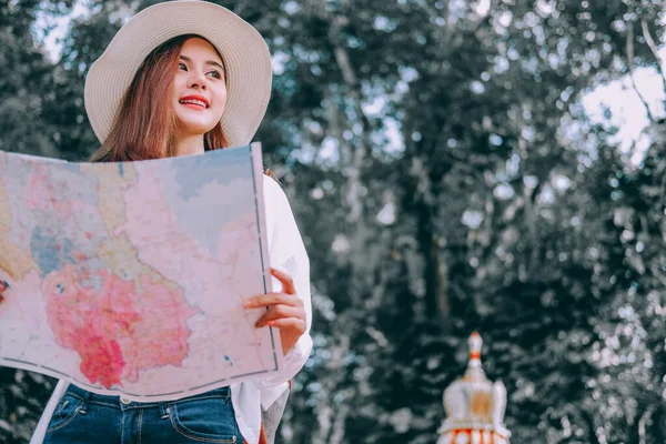 woman traveler tourist with map. journey trip travel concept