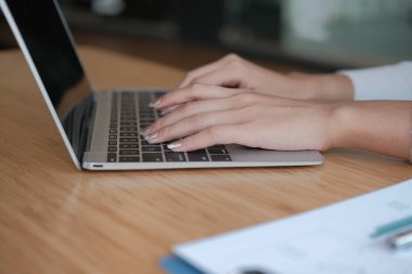 businesswoman freelancer working with computer. woman analyzing 
