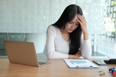 businesswoman feeling tired, frustrated stressed from hard work.