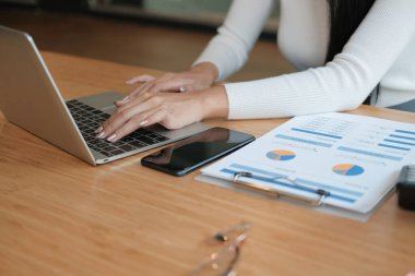 businesswoman freelancer working with computer. woman analyzing 