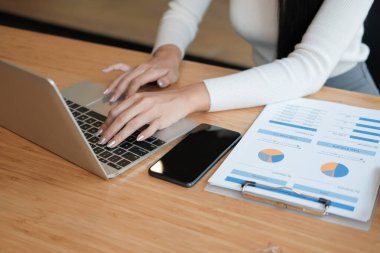 businesswoman freelancer working with computer. woman analyzing 