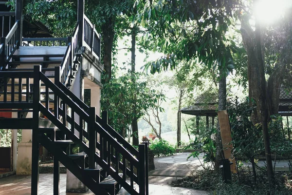 Sunlight on wood stairs of traditional Thal house — Stock Photo, Image