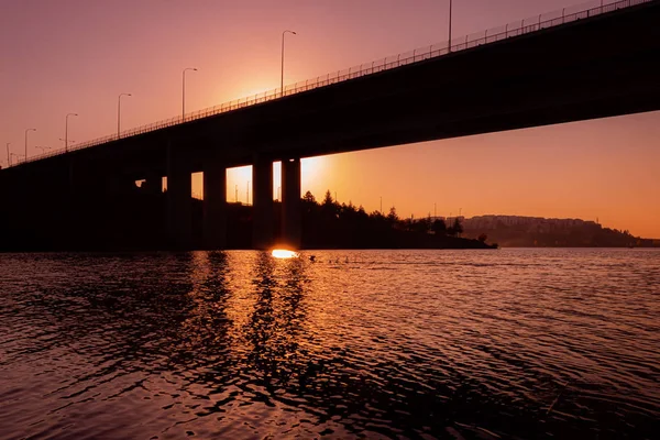 sunset, bridge and lake skyline colors