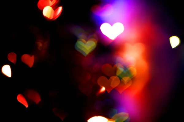 Bokeh en forma de corazón. Fondo colorido abstracto . — Foto de Stock