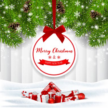 Karlı hediye kutuları, ahşap tahta, yeşil ladin dalları ve Mutlu Noeller metni. Kış tatili tebrik kartı..