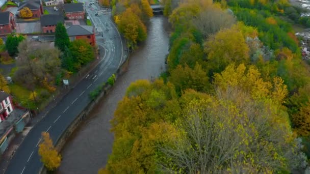 Aerial footage of Meadowhall, Sheffield and the surrounded area flooded via the River Don. Police cordon off roads for safety. — Stock Video