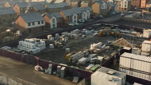 Rotherham, UK - 30th November 2019: Construction yard storing building materials for new houses on the Waverley estate in Rotherham, South Yorkshire — Stock Video