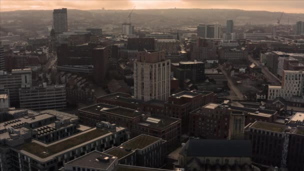 Aerial footage of Sheffield City, South Yorkshire, UK during a golden frosty winter morning in December as the Christmas Markets open — Stock Video