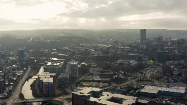 Sheffield, UK - 1st December 2019: Aerial view over Sheffield City, South Yorkshire, during a beautiful cold sunrise over the Christmas markets — Stock Video