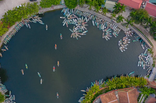 Traditional Boat Tours around Ninh Binh in Northern Vietnam birdseye aerial view shot with a drone