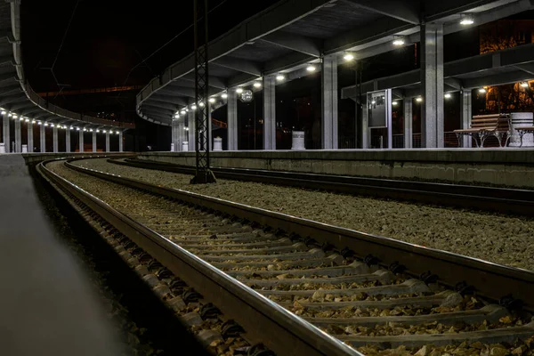 Belgrade, Serbia - Platform view at empty railway train station at night