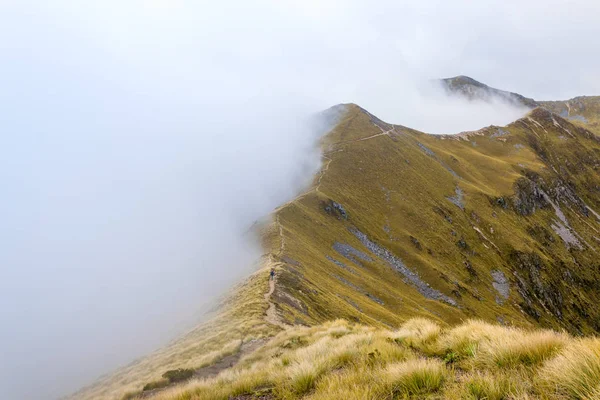 Mountain ridge in clouds — Stock Photo, Image