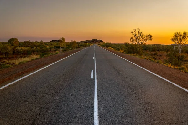 Sunset over australian highway - Stock-foto