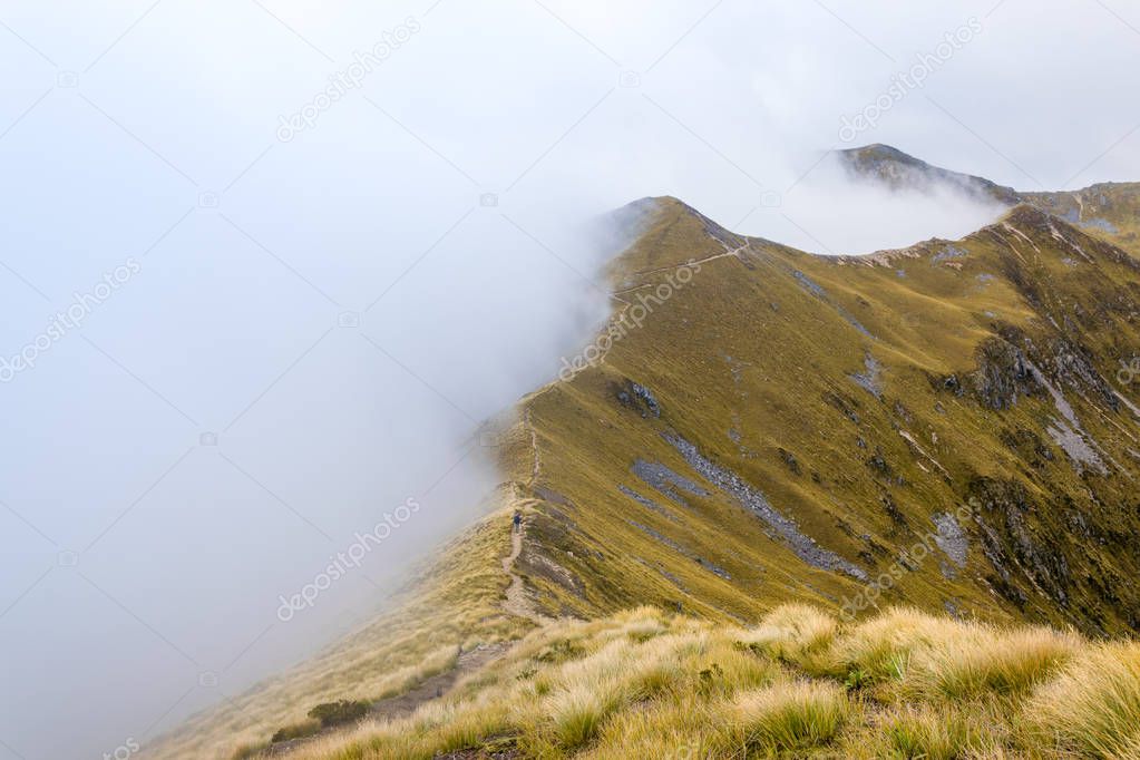 Mountain ridge in clouds