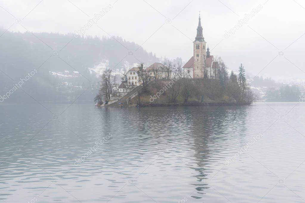 Lake Bled in winter mist, Triglav national park slovenia