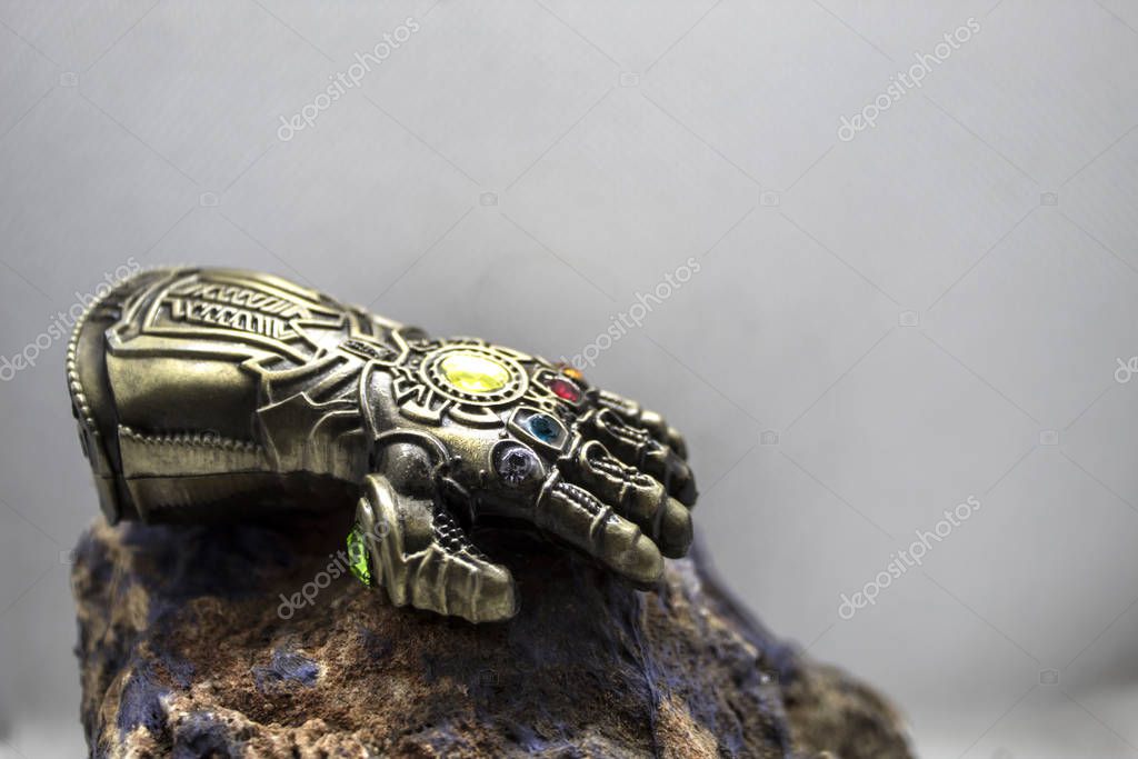Bangkok, Thailand - January 18, 2020: Infinity Gauntlet - a powerful glove with six Infinity Stones, from Marvel Cinematic Universe & Avengers