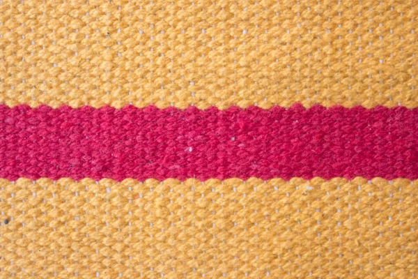 cotton rug close-up. knitted rug with large threads.