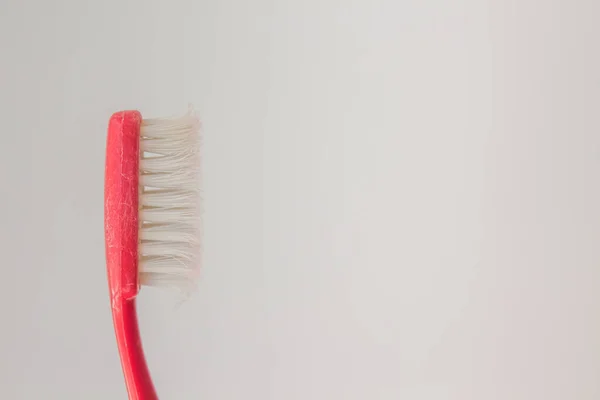 Old Red Toothbrush White Gray Background Close Card Copy Space — Stock Photo, Image