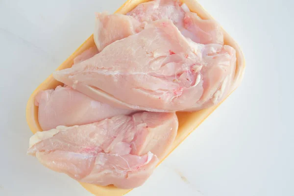 Closeup Raw Chicken Fillet White Marble Table Top View Flat — Stock Photo, Image