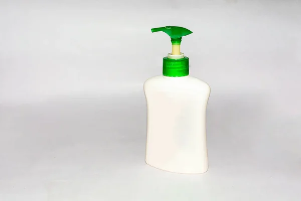 Hand sanitizer antibacterial gel to protect against flu and coronavirus disease.Hand sanitizer bottle on white background side view and copy space.