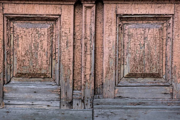Fragment van een oude bruin geschilderde deur, achtergrond, oud houten t — Stockfoto