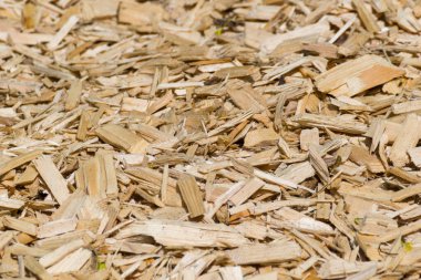 Ahşap parçaları şeklinde soyut arka plan açık kahverengi ve sarı. Yerde tahta parçaları var..